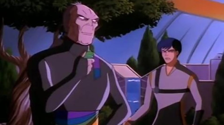 A purple alien smiling at David in the series Invasion America