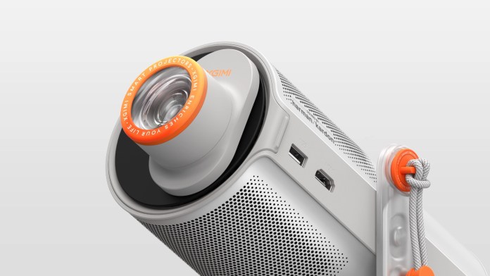 Close-up view of the XGIMI MoGo 4 portable projector showcasing the lens, speakers, and design details.