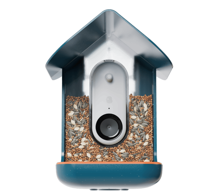 Smart bird feeder with a built-in camera and seed compartment, designed for birdwatching and monitoring wildlife.