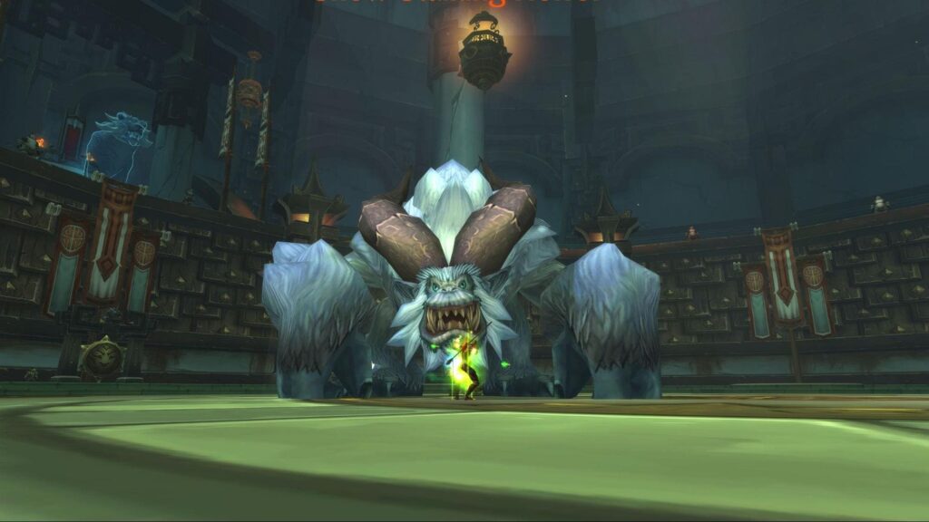 WoW MoP Classic player fighting giant beast in Brawler’s Guild arena