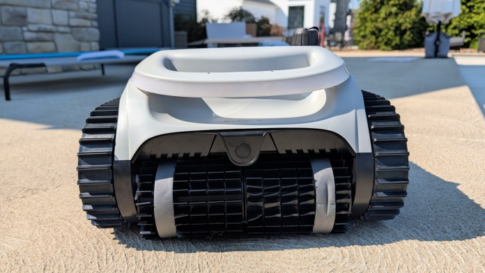 Front view of the Bublue BuHybrid L6 robotic pool cleaner, showcasing its sleek design, tank-style tracks, and brush setup, ready for pool cleaning.