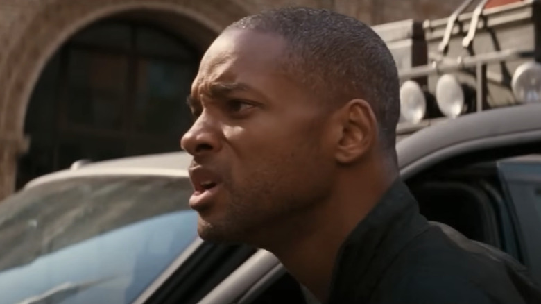 Will Smith's Dr. Robert Neville looks off into the distance in I Am Legend