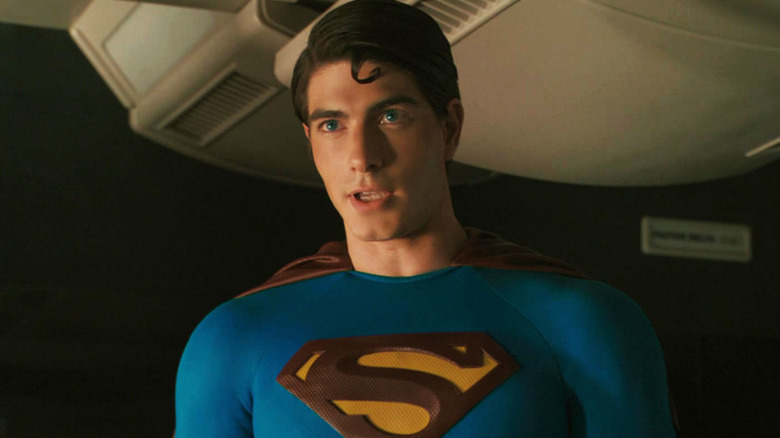 Brandon Ruth's Superman stands inside a plane cabin in Superman Returns
