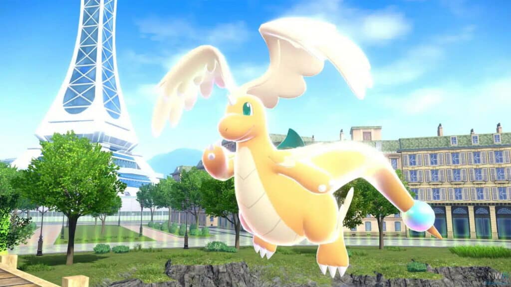 Mega Dragonite hovers above a city park with landmarks during Pokémon Mega Evolutions