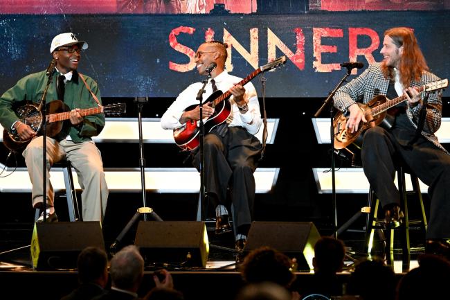 Miles Caton, Raphael Saadiq and Ludwig Göransson perform onstage at the 39th American Cinematheque Awards held at The Beverly Hilton on November 20, 2025 in Los Angeles, California.