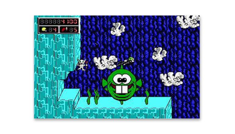 Commander Keen gameplay featuring a smiling green Dopefish