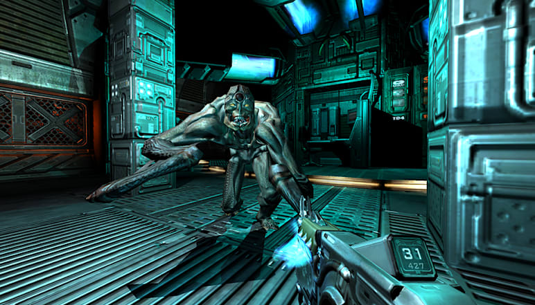 The player attempts to attack a demon with a plasma weapon in DOOM 3