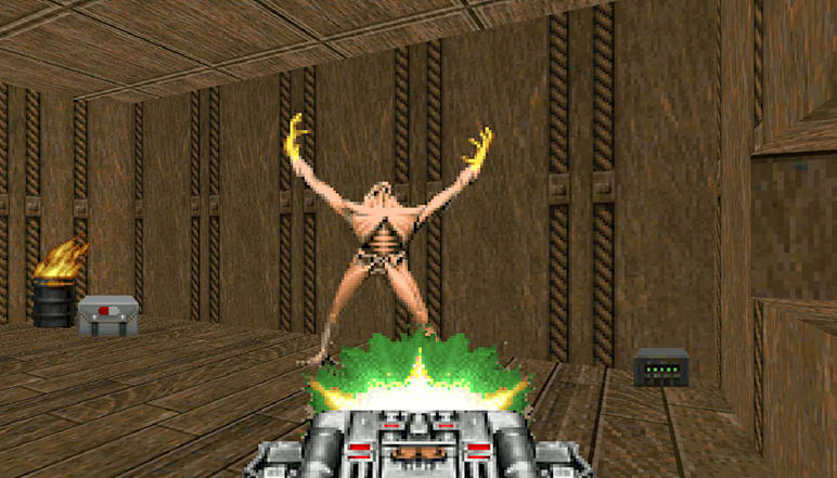 The player charges their BFG 9000 at an Archvile in DOOM II